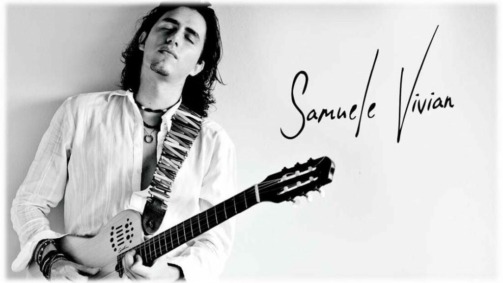 Samuele Vivian mit Gitarre und seiner Unterschrift